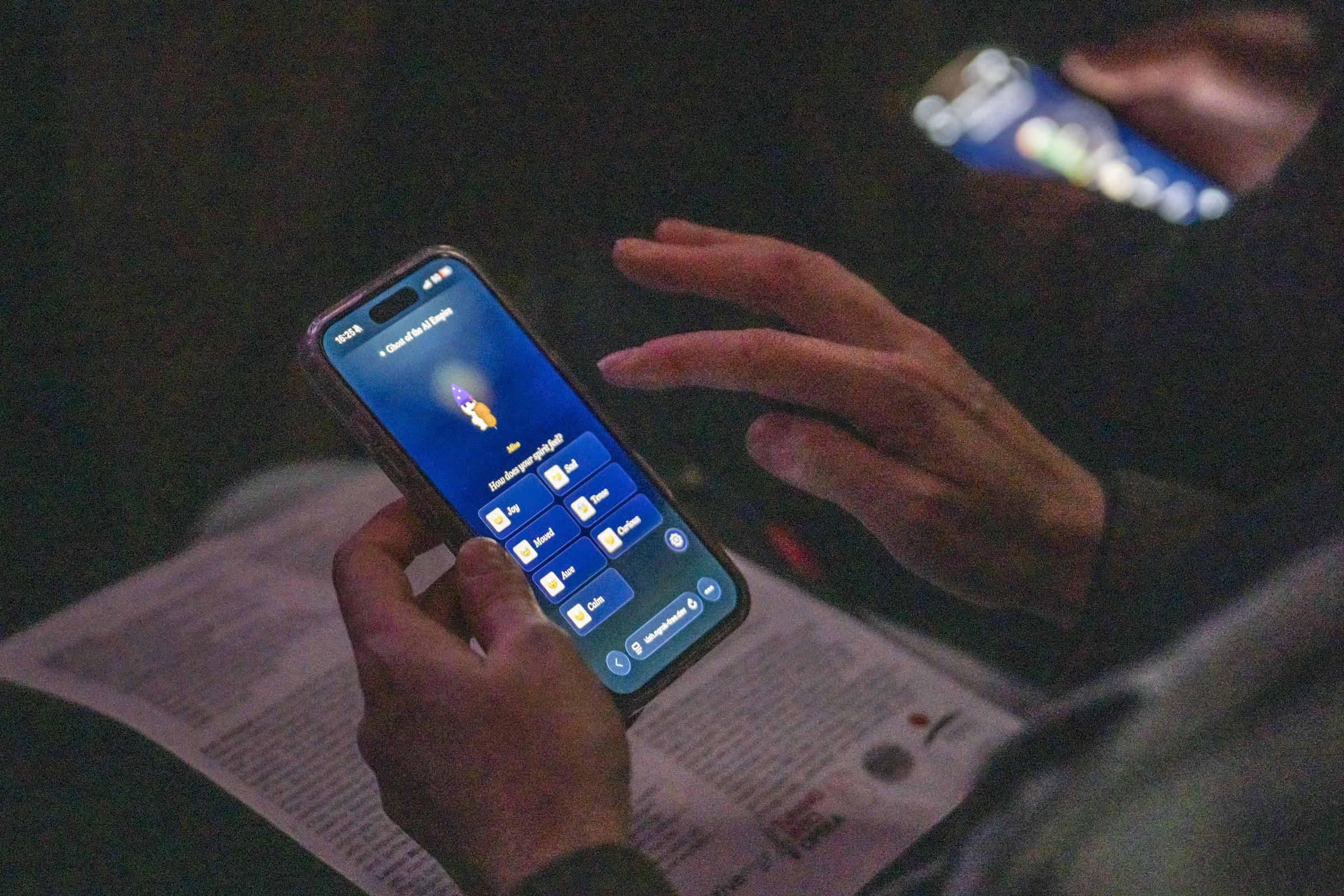 An audience member plays the opera’s interactive instrument on a phone